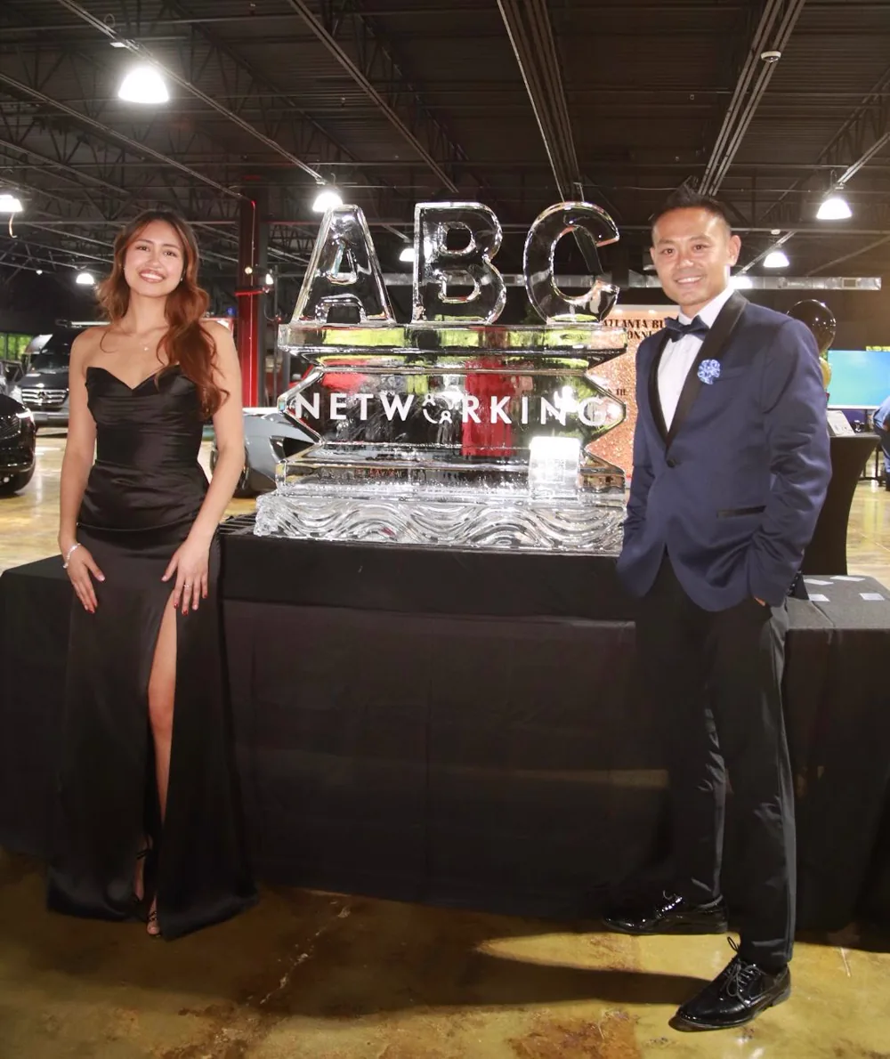 Atlanta Business Connections hosts beside the ABC ice sculpture at the 2025 gala